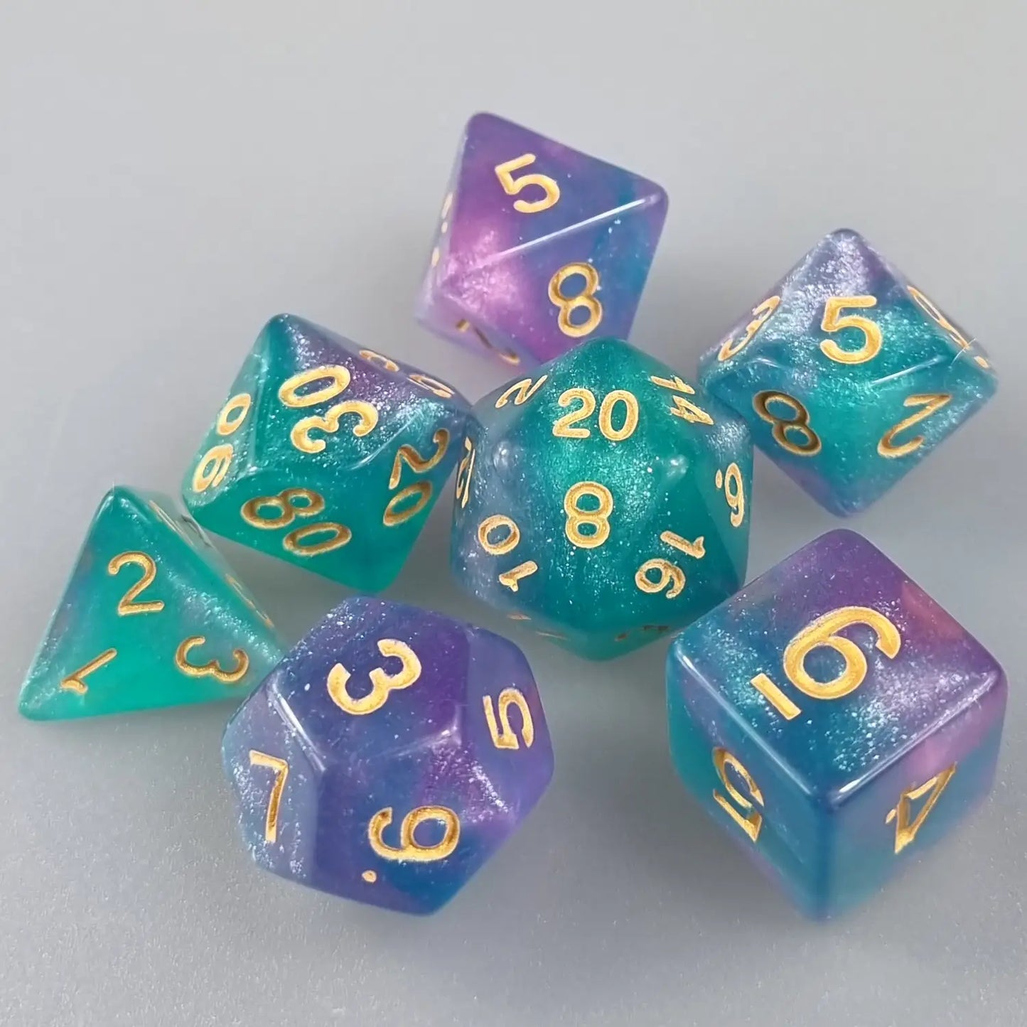 Turquoise & Purple Cosmos Dungeons & Dragons Dice Set DiceBag.co.uk